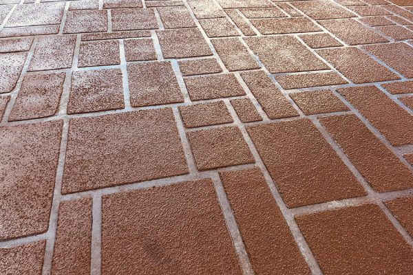 SPRAY-ON DECORATIVE CONCRETE DRIVEWAYS