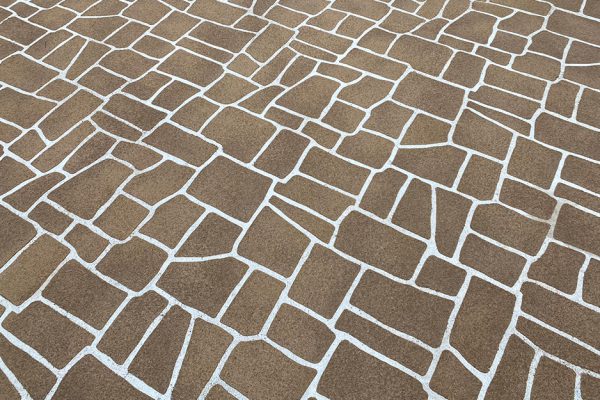 SPRAY-ON DECORATIVE CONCRETE DRIVEWAYS